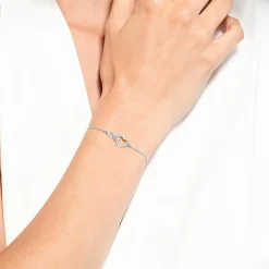 BRACELET Swarovski 5524421 - Bracelet métal argenté infini coeur cristaux sertis