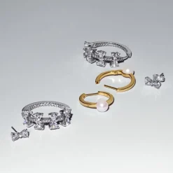 Clous d’Oreilles Petit Nœud Scintillant